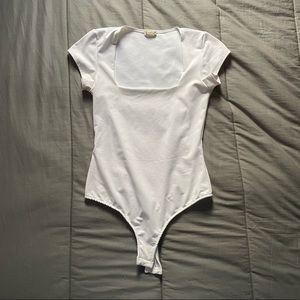 size xs francesca’s white body suit